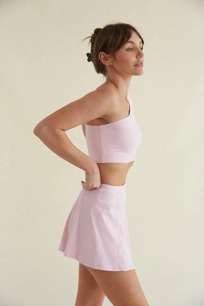 Avery Smoothing Flare Tennis Skort in Pink